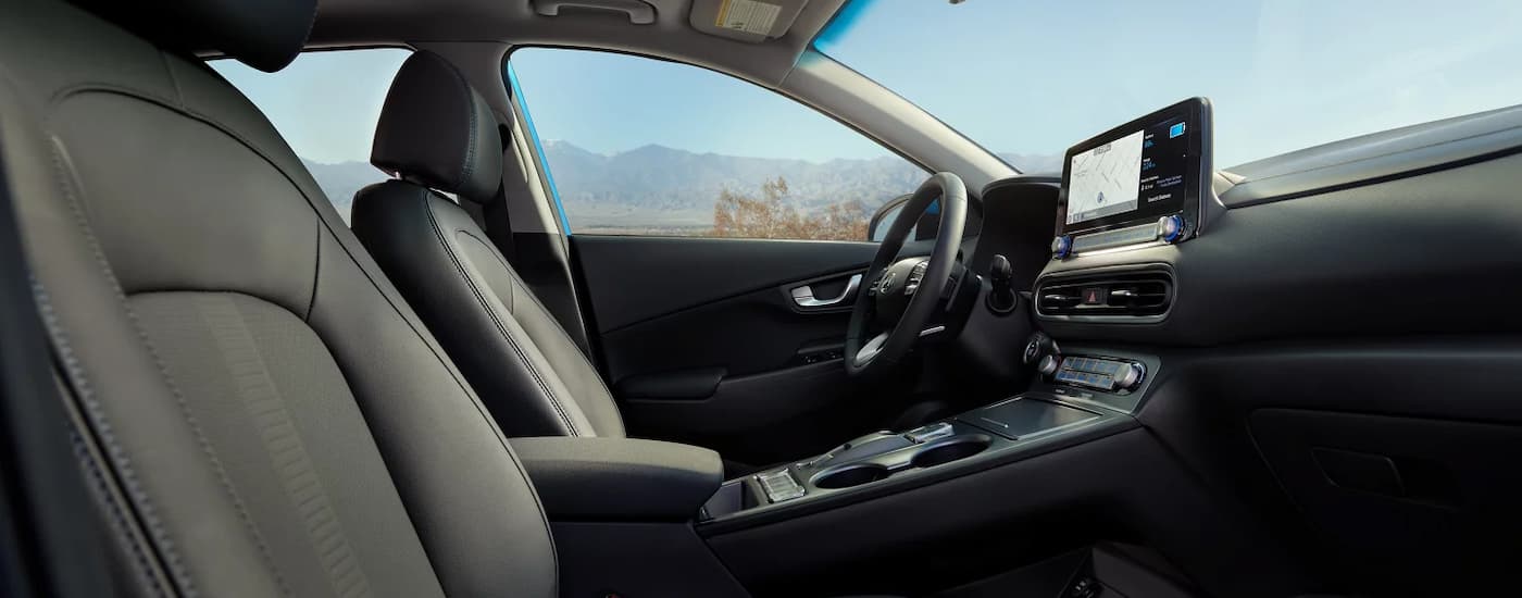 Front black seats and center console in 2023 Hyundai Kona at a used Hyundai dealer